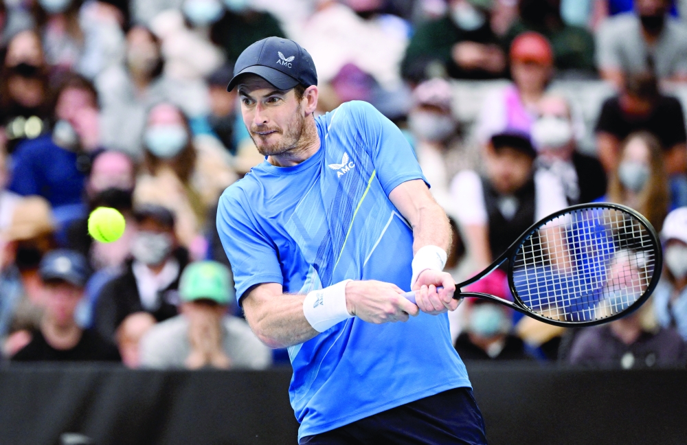 Britain's Andy Murray in action during his first round match against Georgia's Nikoloz Basilashvili. -- Reuters 