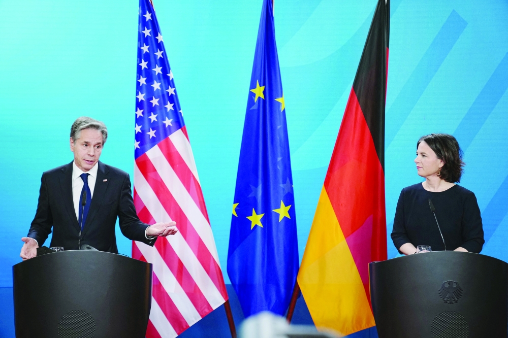 German Foreign Minister Annalena Baerbock (R) and US Secretary of State Antony Blinken address a press conference after meeting with their counterparts from France and Britain at the German Foreign Office in Berlin on Thursday. - AFP