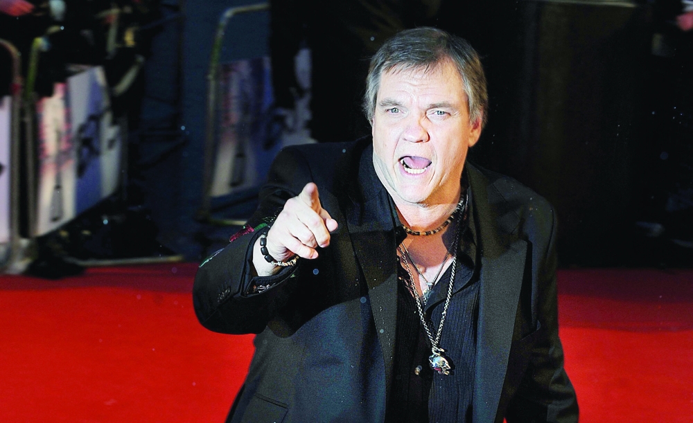 (FILES) In this file photo taken on February 16, 2010, US singer Meat Loaf arrives for The Brit Awards 2010 at Earls Court in London. Meat Loaf, famous for his "Bat Out of Hell" rock anthem, has died aged 74, according to a statement on January 21, 2022. (Photo by Ben STANSALL / AFP)
