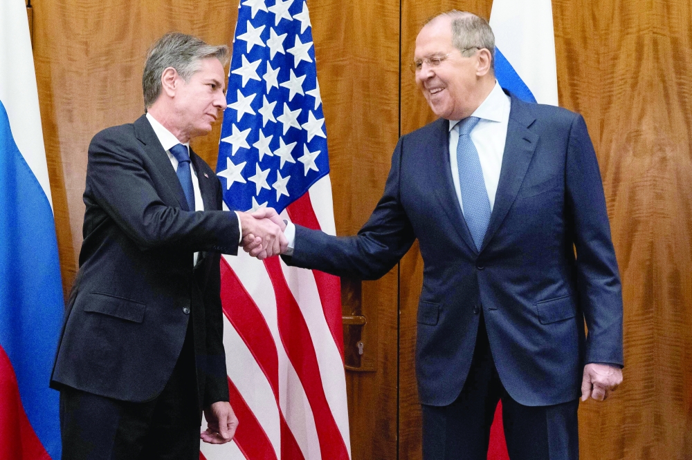 US Secretary of State Antony Blinken (L) with Russian Foreign Minister Sergey Lavrov before their meeting on Friday in Geneva, Switzerland. - AFP