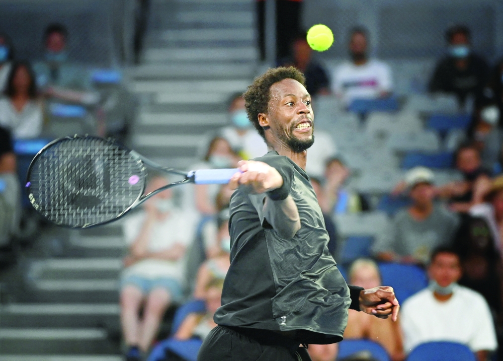 France's Gael Monfils in action during his fourth round match against Serbia's Miomir Kecmanovic. -- Reuters