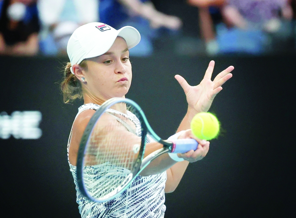 Australia's Ashleigh Barty in action during her fourth round match against Amanda Anisimova of the US. -- Reuters