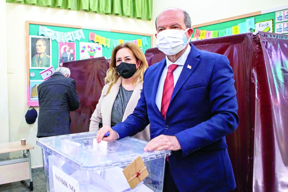 President Ersin Tatar casts his ballot at a polling station in the northern part of Cyprus' divided capital Nicosia, in the self-declared Turkish Republic of Northern Cyprus. - AFP 