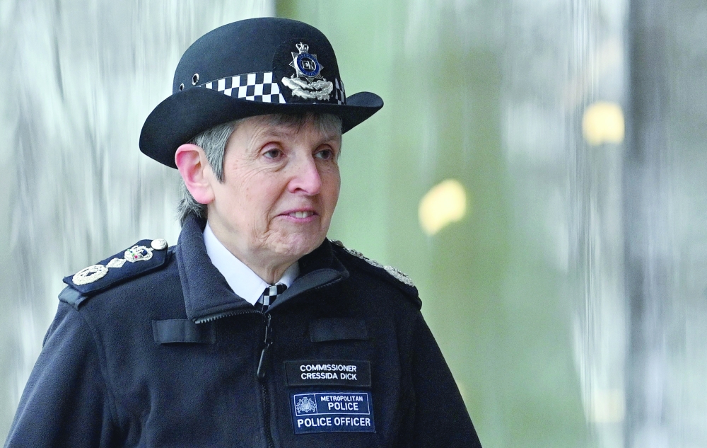 Metropolitan Police Commissioner Cressida Dick walks towards New Scotland Yard in central London. - AFP