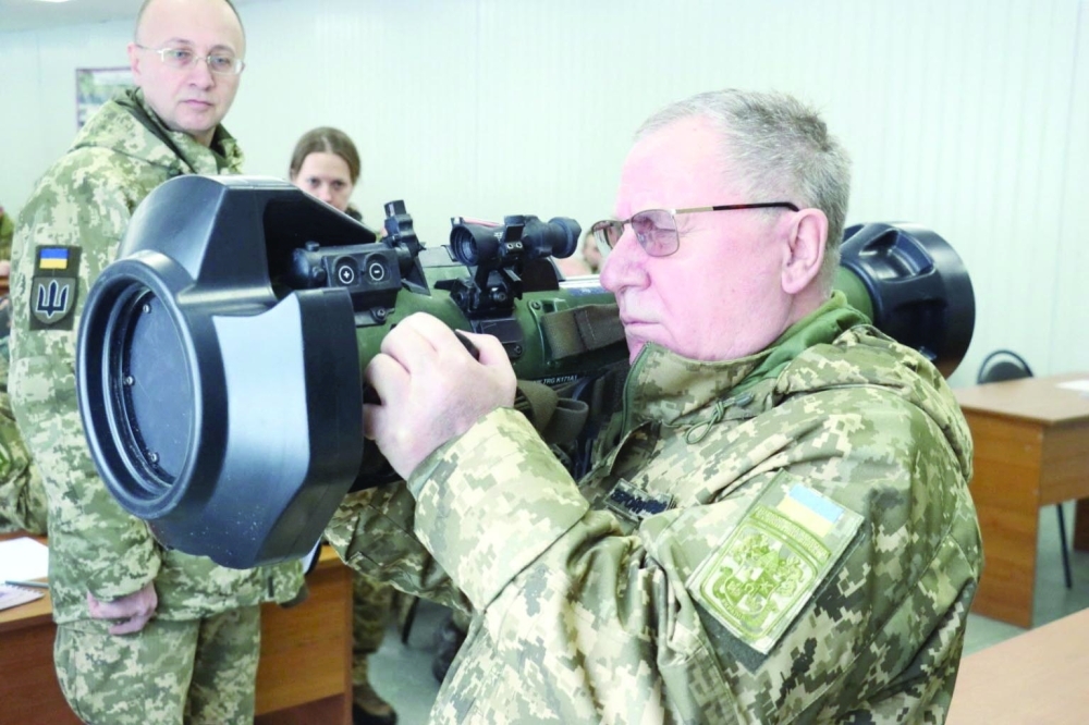 Pavlo Tkachuk, Head of the Hetman Petro Sahaydachnyi National Army Academy, holds a light anti-tank weapon supplied by Britain during a training for Ukrainian service members in Lviv, Ukraine. - Reuters