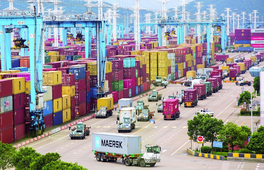 Lines of trucks are seen at a container terminal of Ningbo Zhoushan port in Zhejiang province, China. — Reuters