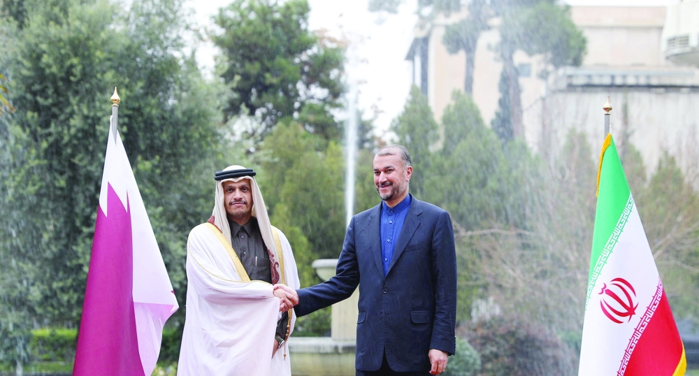 Iran's Foreign Minister Hossein Amir-Abdollahian meets with Qatar's Deputy Prime Minister and Foreign Minister Mohammed bin Abdulrahman al Thani, in Tehran, on Thursday. - Reuters 