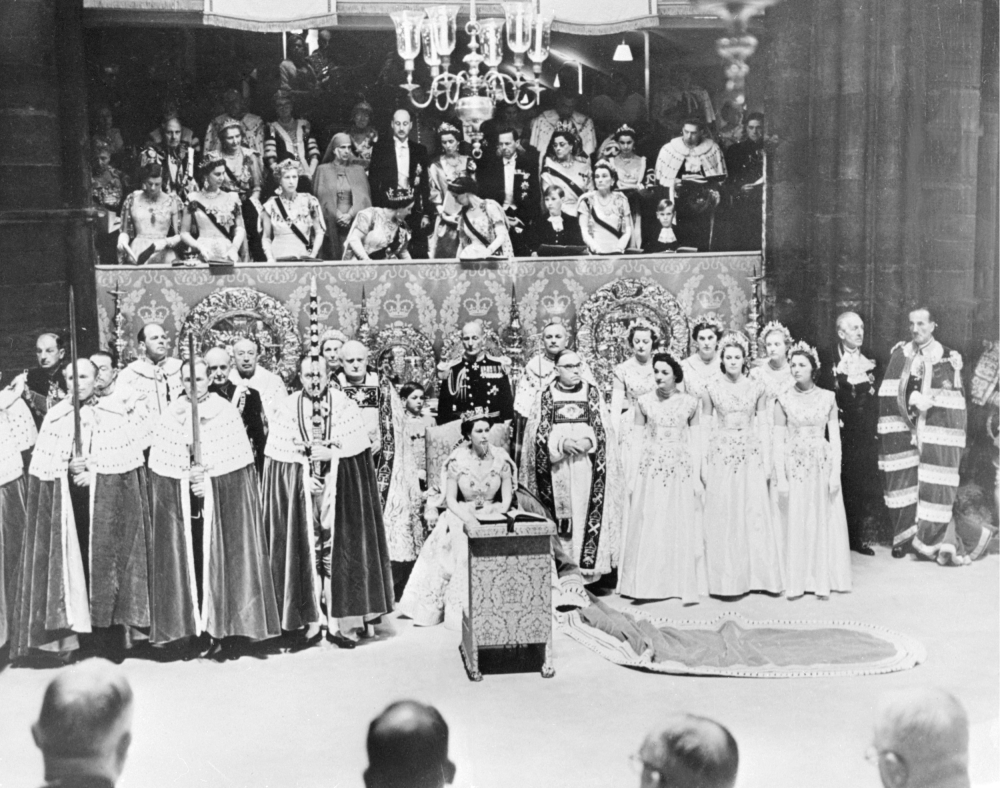  In this file photo taken on June 02, 1953 Britain's Queen Elizabeth II (C) sits in Westminster Abbey, on her coronation day in London. 