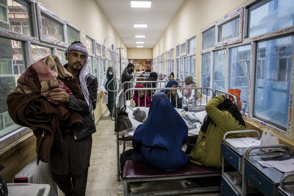 Hospital beds in the hallways as there wasn't enough space in the wards at the Indira Gandhi Children's Hospital in Kabul, Afghanistan, Jan. 12, 2022.  (Jim Huylebroek/The New York Times)