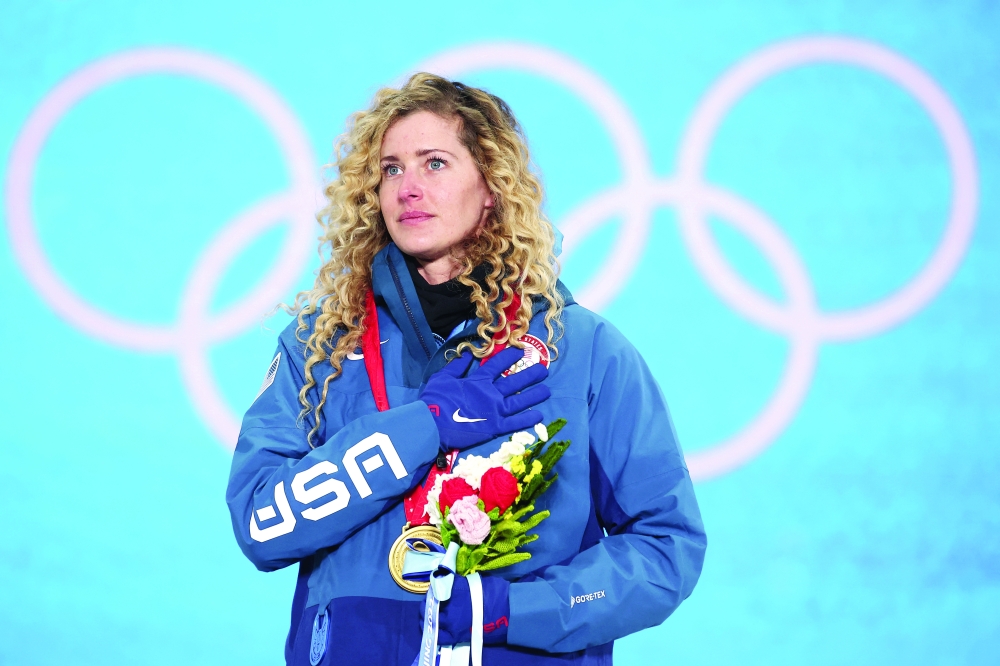 Lindsey Jacobellis of the United States celebrates on the podium. -- Reuters
