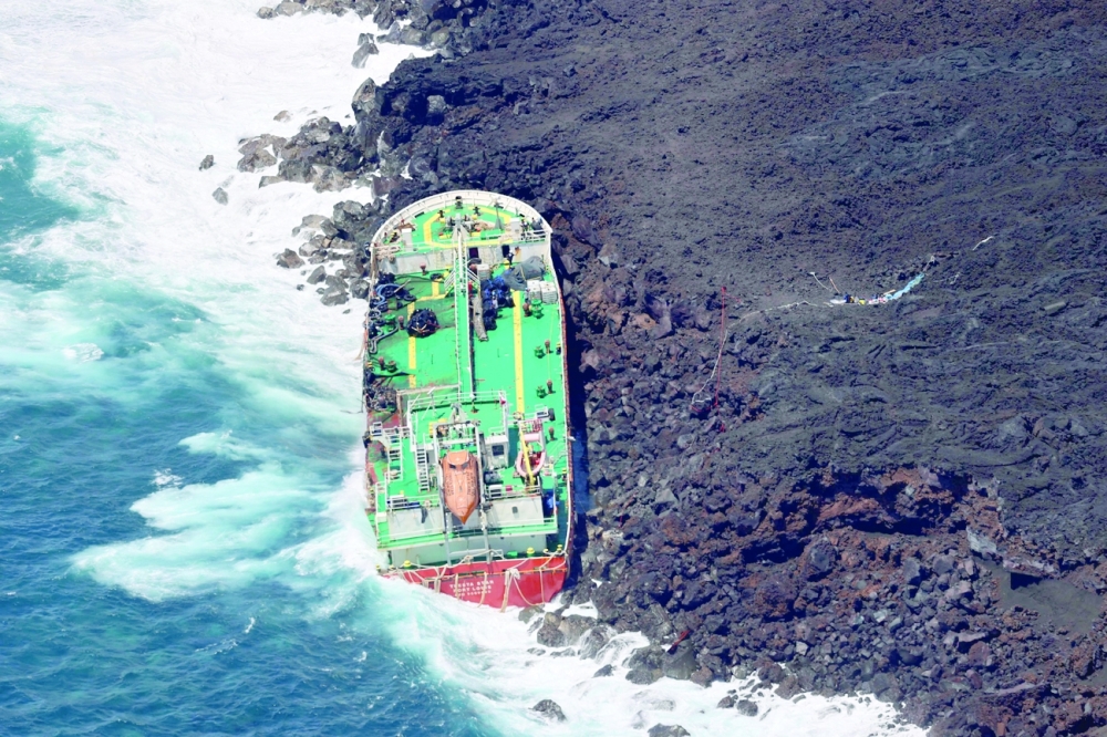 The Mauritian oil tanker Tresta Star, stranded off the coast of Reunion Island, at Le Tremblet, place of the 2007 lava flow, near Saint-Philippe, after the Batsirai cyclone hit Madagascar and the area on February 6. - AFP