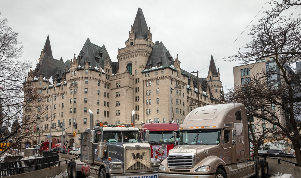 Trucks block streets in Ottawa, Ontario, on Friday, Feb. 11, 2022, in Canada, where protesters are demanding an end to vaccine mandates and coronavirus restrictions. (Brett Gundlock/The New York Times)