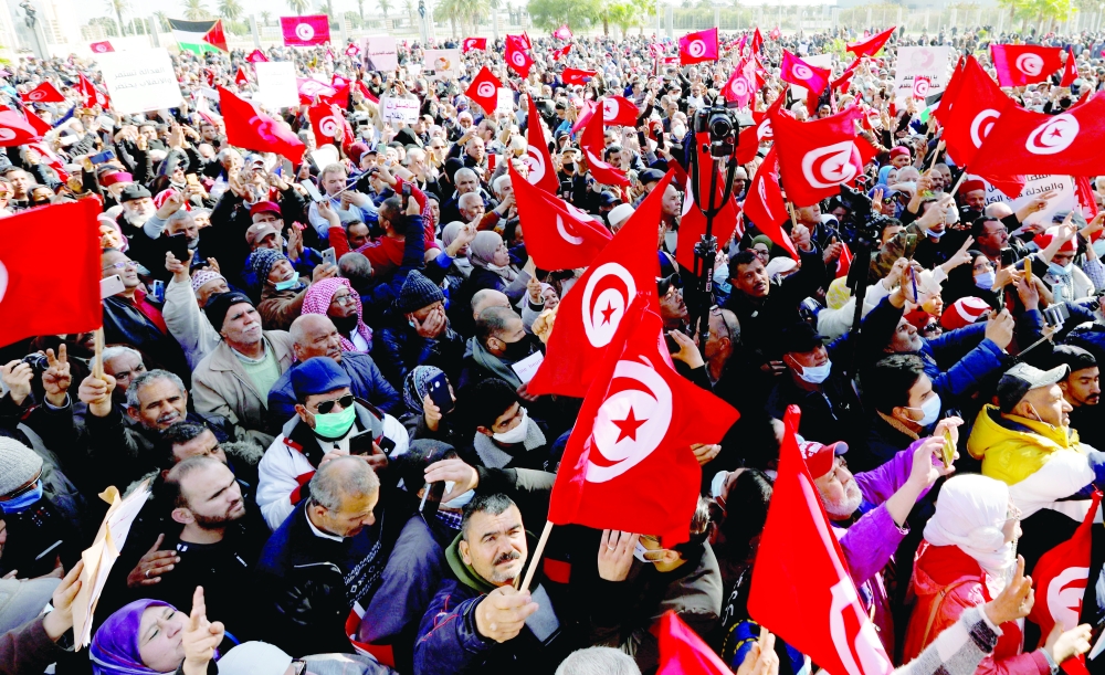Demonstrators protest against Tunisian President Kais Saied's seizure of governing powers in Tunis. - Reuters
