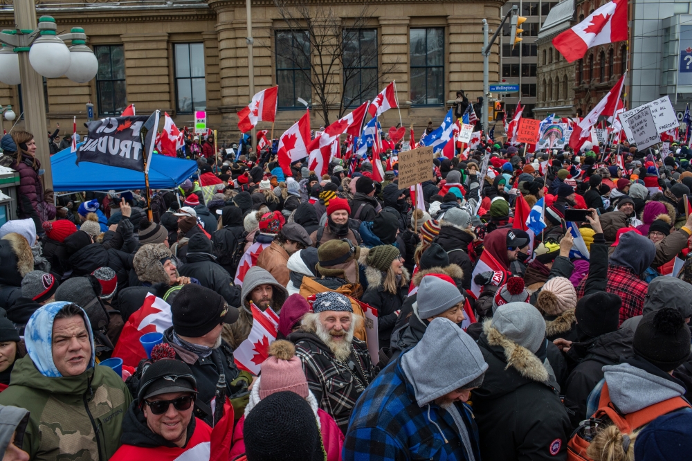 Protesters in downtown Ottawa, Ontario, on Saturday, Feb. 12, 2022, in Canada, where they are demanding an end to vaccine mandates and coronavirus restrictions. (Brett Gundlock/The New York Times)