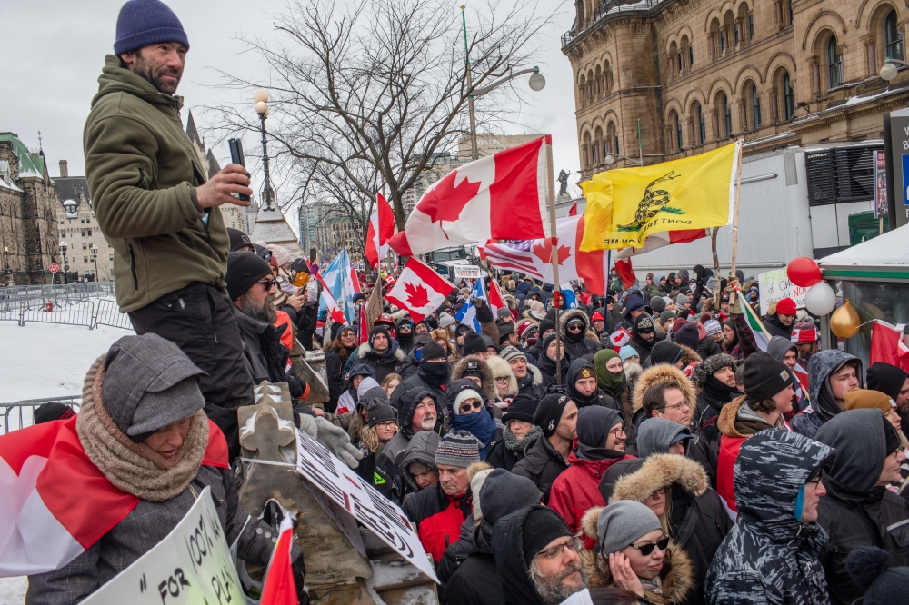 Protesters in downtown Ottawa, Ontario, on Saturday, Feb. 12, 2022, in Canada, where they are demanding an end to vaccine mandates and coronavirus restrictions. (Brett Gundlock/The New York Times)