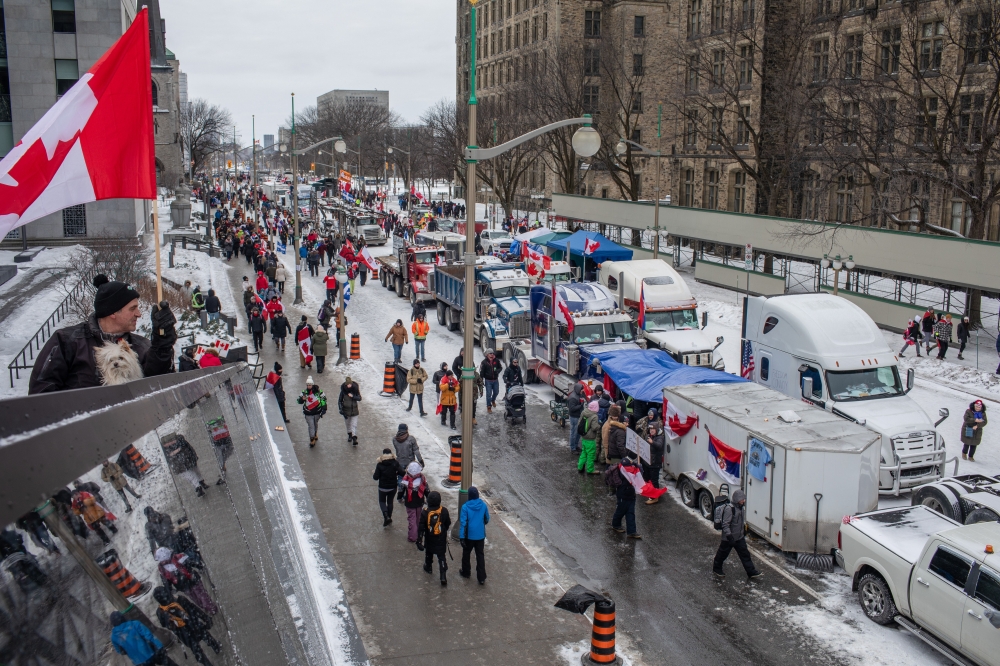 Protesters in downtown Ottawa, Ontario, on Saturday, Feb. 12, 2022, in Canada, where they are demanding an end to vaccine mandates and coronavirus restrictions. (Brett Gundlock/The New York Times)