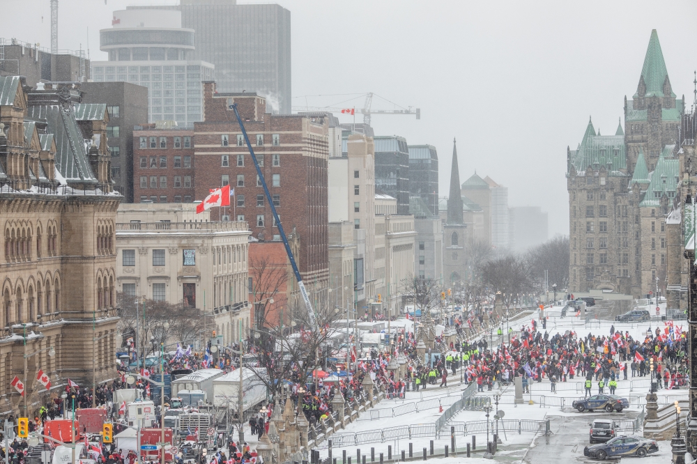 Anti-vaccine mandate protesters in downtown Ottawa, where they have blocked streets around Canadas Parliament building for weeks, Feb. 12, 2022. (Brett Gundlock/The New York Times). 