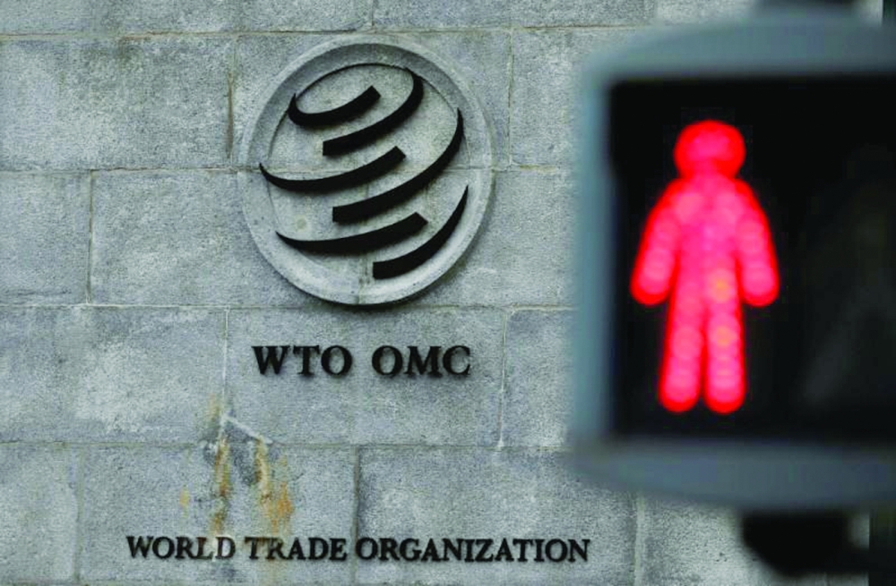  A red light is pictured at a pedestrian crossing in front of the WTO headquarters in Geneva. — AFP