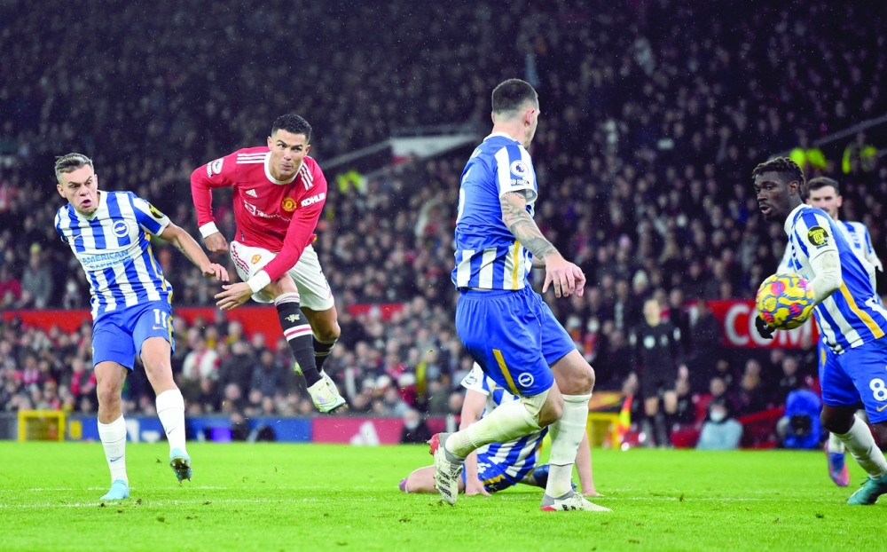 Manchester United's Cristiano Ronaldo scores their first goal REUTERS/