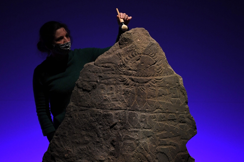 A brush a carved stone dated of 2500 BC.