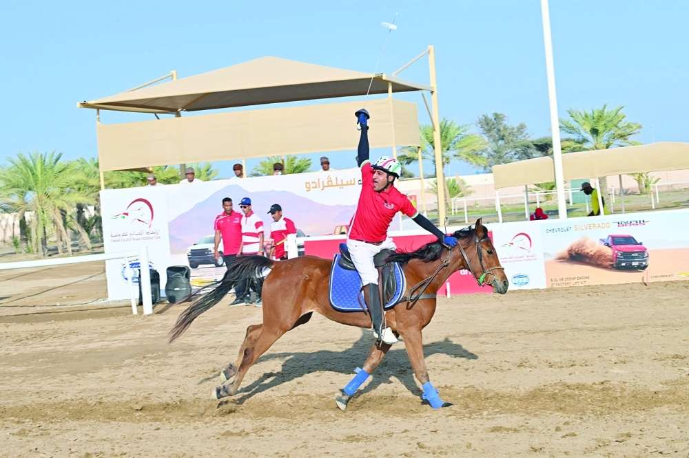 Tent pegging action during the Ministry's Shield championship. -- Rashid al Tawki