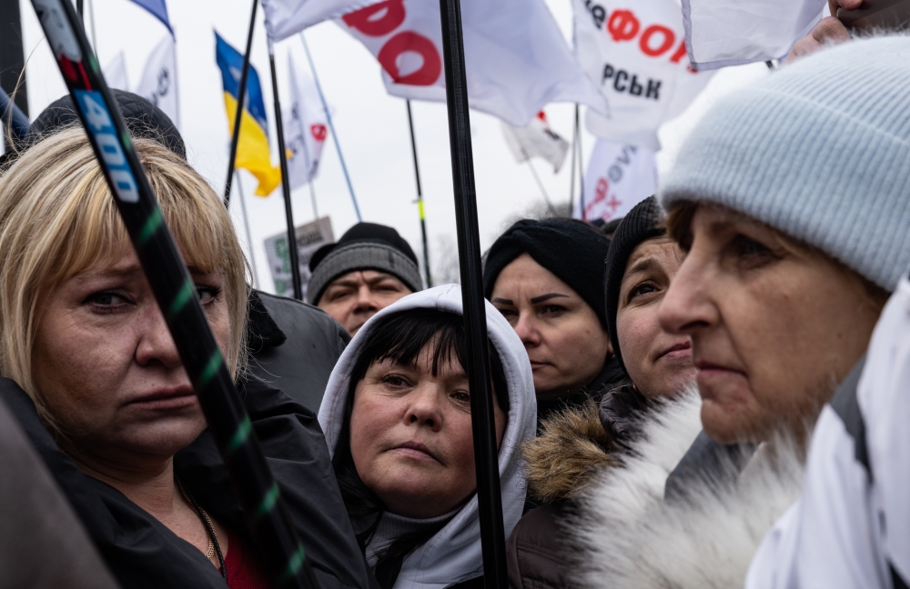Supporters of the "save small business" movement demonstrate outside the Ukrainian Parliament in Kyiv, Ukraine, Feb. 17, 2022.  (Lynsey Addario/The New York Times) 