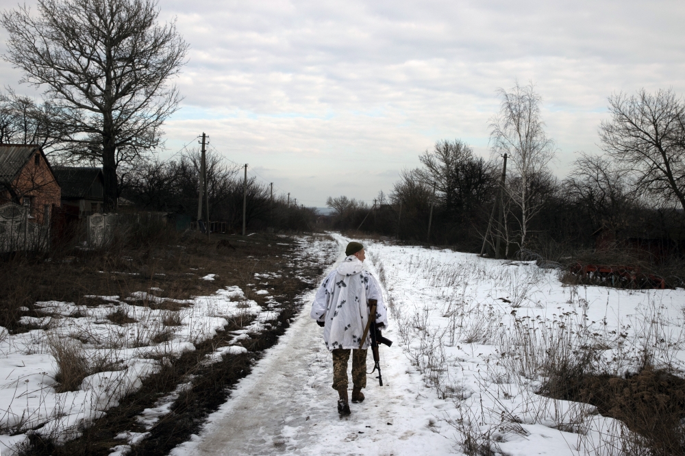 A Ukrainian soldiers at a front line position near Katerynivka, in eastern Ukraine, on Wednesday, Feb. 16, 2022. (Tyler Hicks/The New York Times)