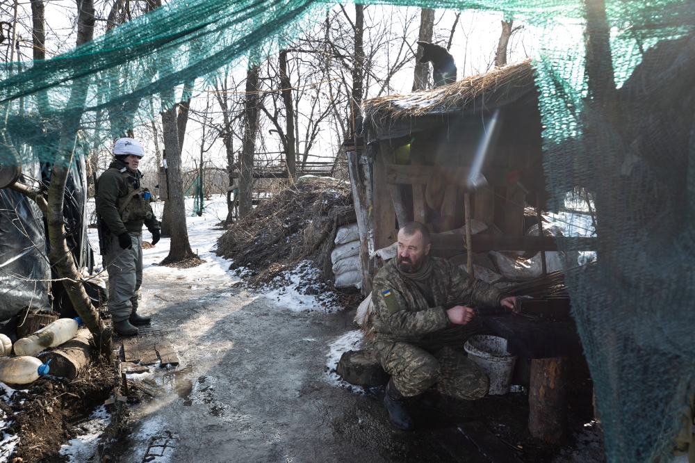 Ukrainian soldiers at a front line position near Katerynivka, in eastern Ukraine, on Wednesday, Feb. 16, 2022. (Tyler Hicks/The New York Times)