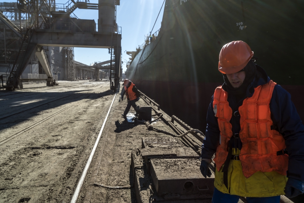 Workers at the port of Mykolaiv, Ukraine, on Monday, Feb. 14, 2022. (Brendan Hoffman/The New York Times)