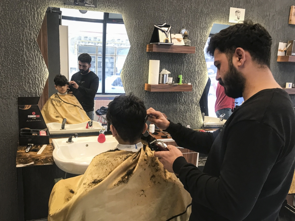 Mahmut Goksu, a barber in Cumra, in central Turkey (The New York Times)