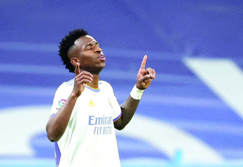 Real Madrid's Vinicius Junior celebrates scoring their second goal. -- Reuters