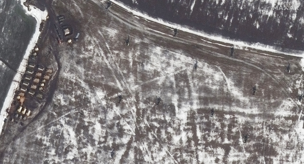 In a satellite image provided by Maxar Technologies, a new Russian military helicopter landing site in Tomarovka, Russia, 20 miles from the Ukrainian border.  (Satellite image ©2022 Maxar Technologies via The New York Times)  