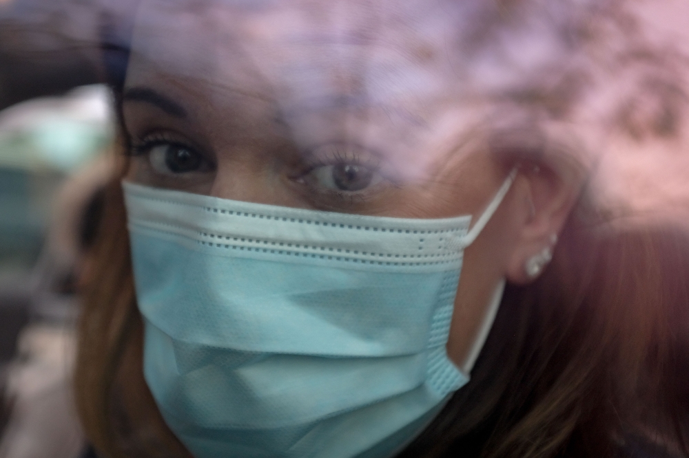 Samantha Lewis, who suffers from long Covid, in Aurora, Ill., Oct. 7, 2021.