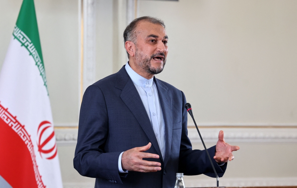 Iranian Foreign Minister Hossein Amir-Abdoulahian speaks during a joint press conference in Tehran. - AFP

