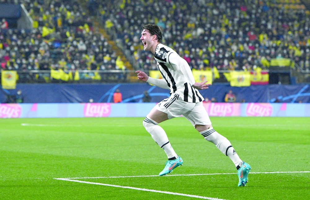 Juventus' Dusan Vlahovic celebrates scoring their first goal against Villarreal. -- Reuters