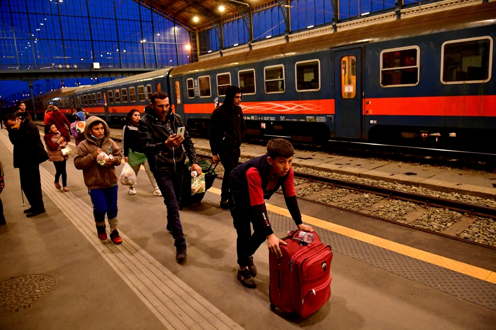 FILE PHOTO: Refugees fleeing from Ukraine arrive at Nyugati station