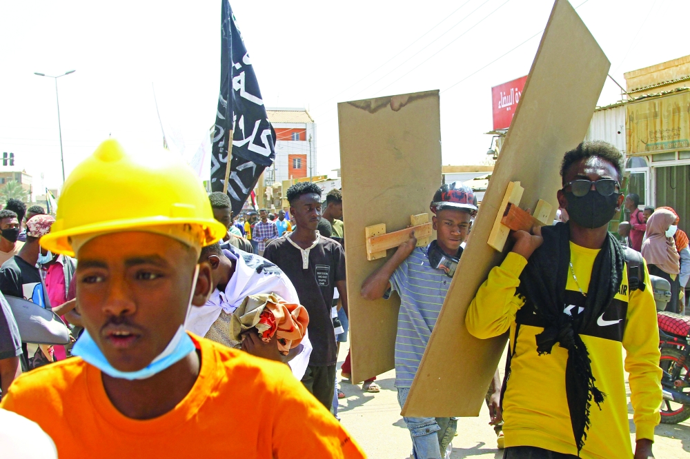 Sudanese anti-coup protesters take part in ongoing demonstrations against the military in Khartoum. - AFP
