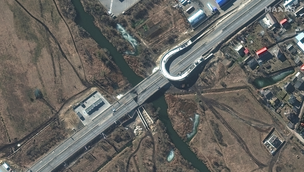 A satellite image shows damaged bridge in Stoyanka, western Kyiv
