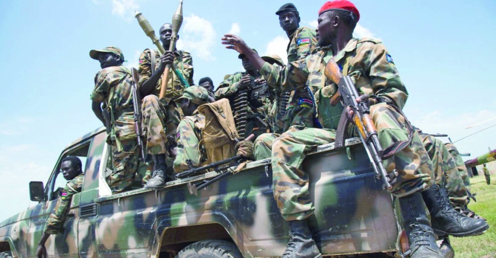 South Sudanese government soldiers in a pick-up truck at the military base in Malakal, northern South Sudan. - AFP File
