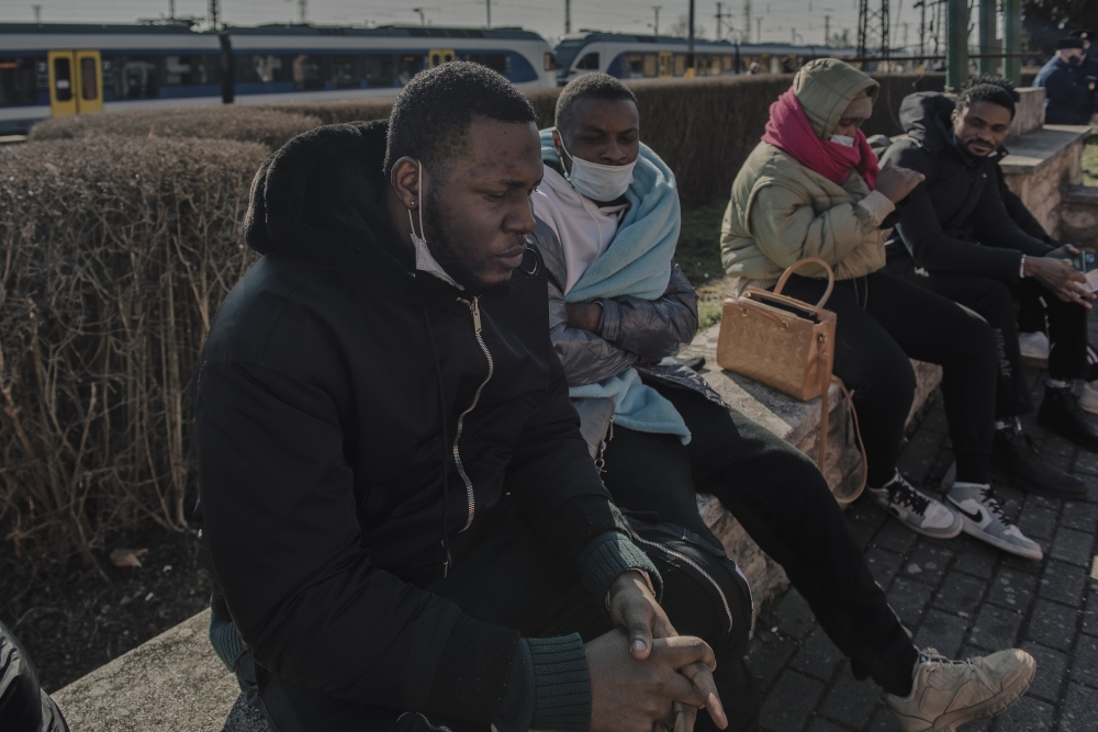 Emmanuel Nwulu, right, a Nigerian studying in Kharkiv, Ukraine, with other fellow students who crossed the Ukrainian border into Zahony, Hungary, Feb. 27, 2022. (Laetitia Vancon/The New York Times)