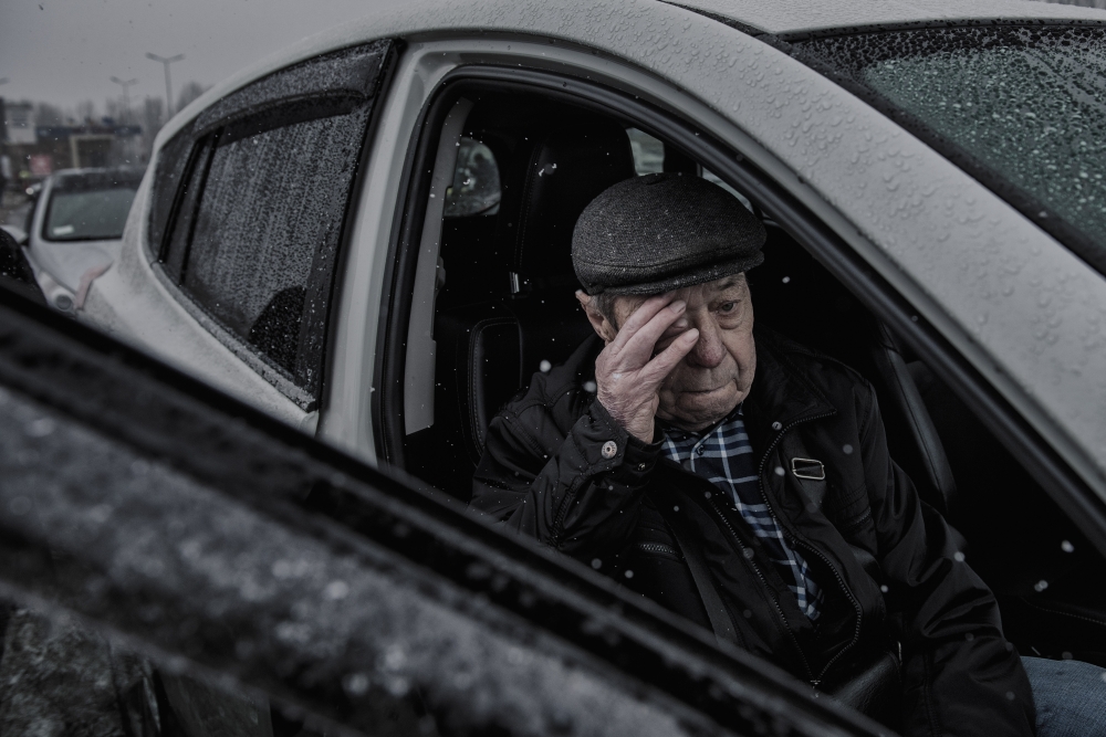Viktor Babenko, an 83-year-old from Odessa traveling in hopes of staying with relatives, at a temporary refugee camp for Ukrainians in Palanca, Moldova, March 1, 2022. (Laetitia Vancon/The New York Times)