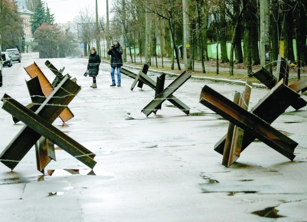 Metal anti-tank barricades known as hedgehogs are seen in Kyiv. -- Reuters
