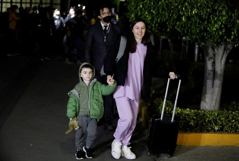 Mexican citizens evacuated from Ukraine arrive at the Benito Juarez International airport in Mexico City