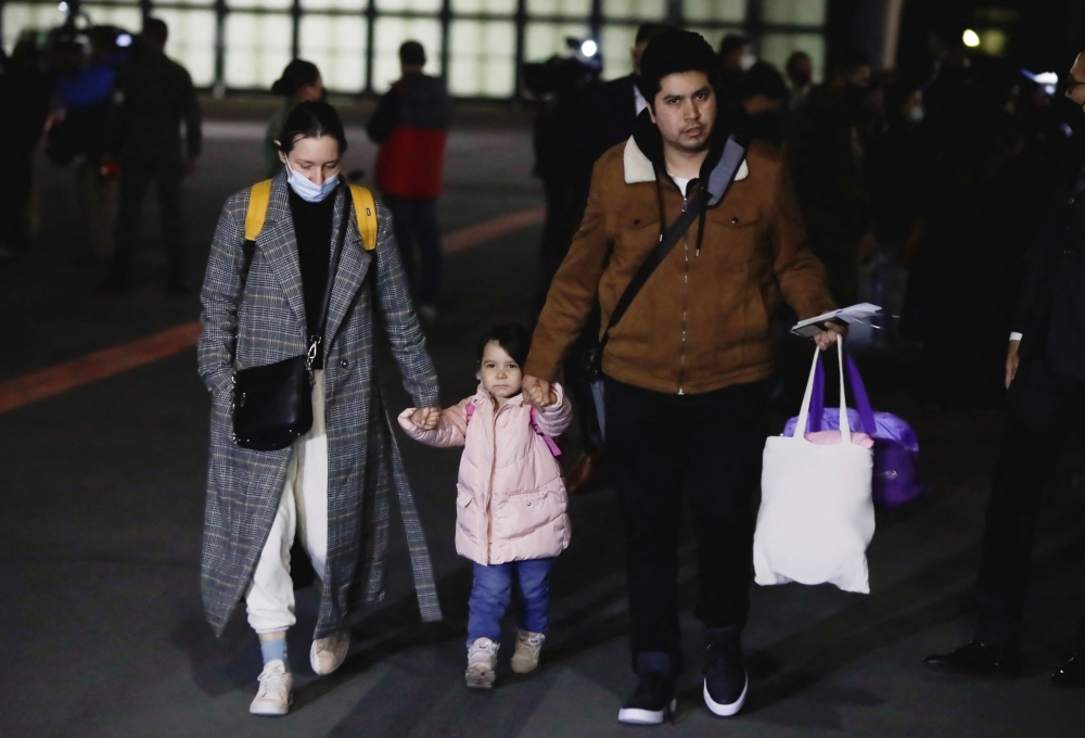 Mexican citizens evacuated from Ukraine arrive at the Benito Juarez International airport in Mexico City