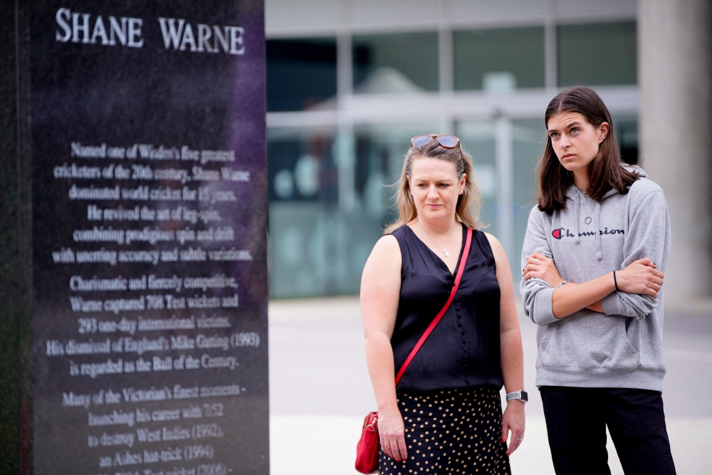People pay tribute to late cricketer Shane Warne at the Melbourne Cricket Ground