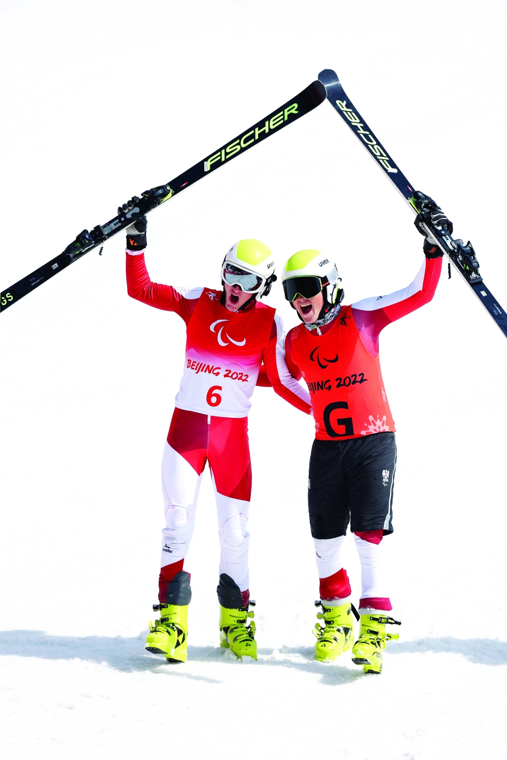 Beijing 2022 Winter Paralympic Games - Para Alpine Skiing - Men's Giant Slalom Vision Impaired - Run 2 - National Alpine Skiing Centre, Yanqing district, Beijing, China - March 10, 2022. Johannes Aigner of Austria celebrates after his run. REUTERS/Peter Cziborra
