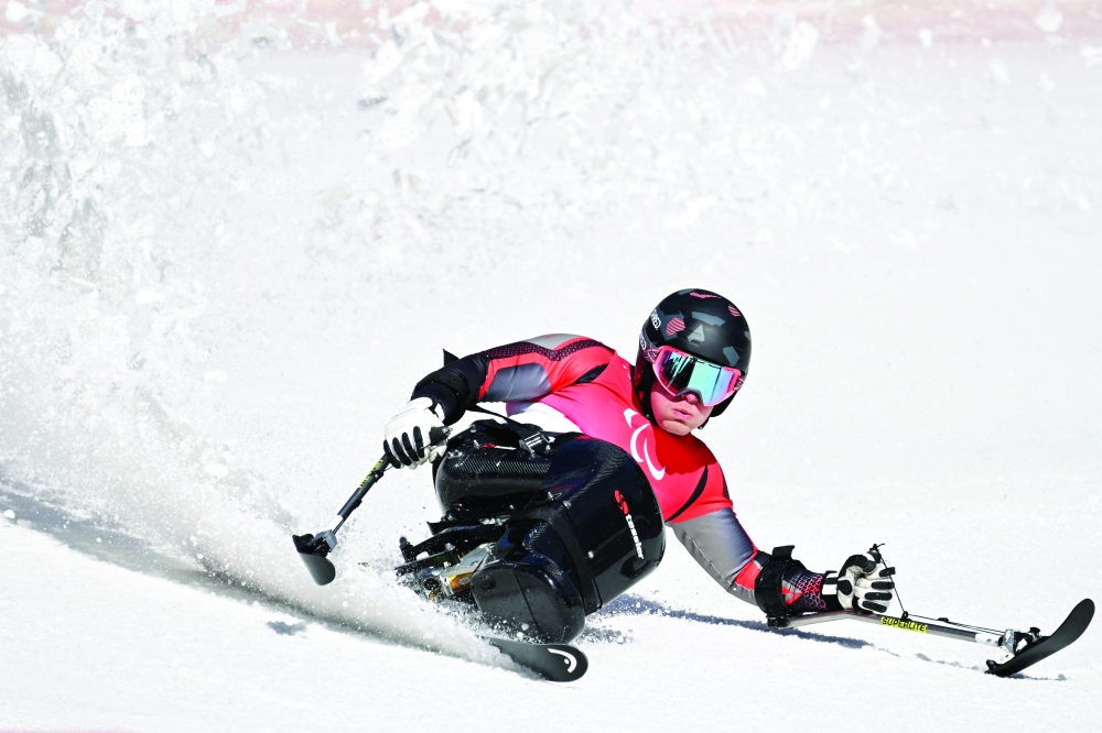 TOPSHOT - Norway's Jesper Pedersen competes in the men's super combined sitting event at the Yanqing National Alpine Skiing Centre in Yanqing during the Beijing 2022 Winter Paralympic Games on March 7, 2022.  - 
 (Photo by WANG Zhao / AFP)

