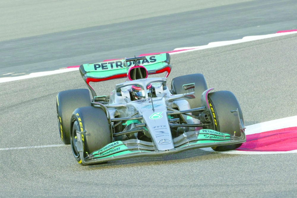 Mercedes' British driver George Russell drives during the first day of Formula One (F1) pre-season testing at the Bahrain International Circuit in the city of Sakhir on March 10, 2022.  (Photo by Giuseppe CACACE / AFP)