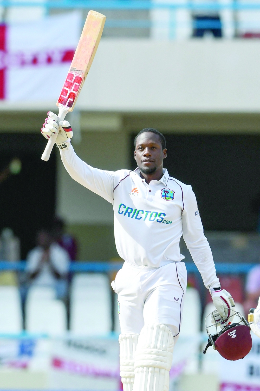 Nkrumah Bonner of West Indies celebrates his century. -- AFP