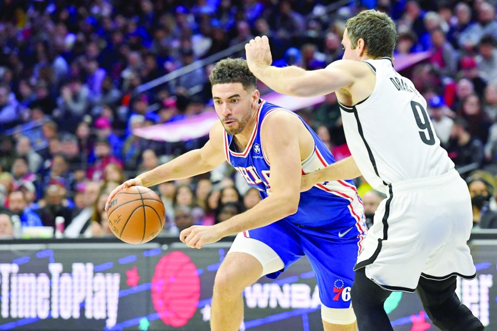 Philadelphia 76ers forward Georges Niang (20) drives to the basket against Brooklyn Nets guard Goran Dragic (9) during the third quarter at Wells Fargo Center. -- USA Today Sports
